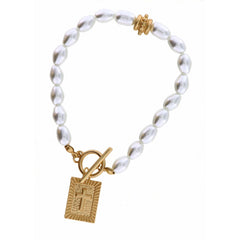 Jane Marie RAISED EDGE RECTANGLE WITH CROSS ON PEARL BRACELET